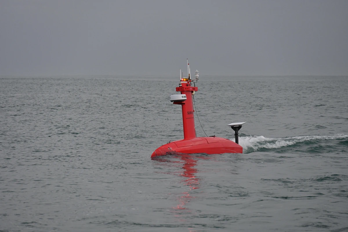 Exail DriX autonomous surface vessel at sea during the DELMOGES research mission.